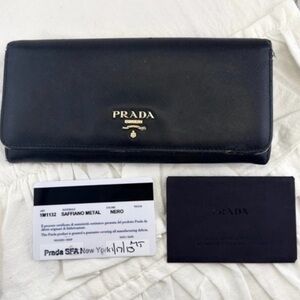 AUTHENTIC Prada Saffiano Metal Continental Flap Wallet. Black.